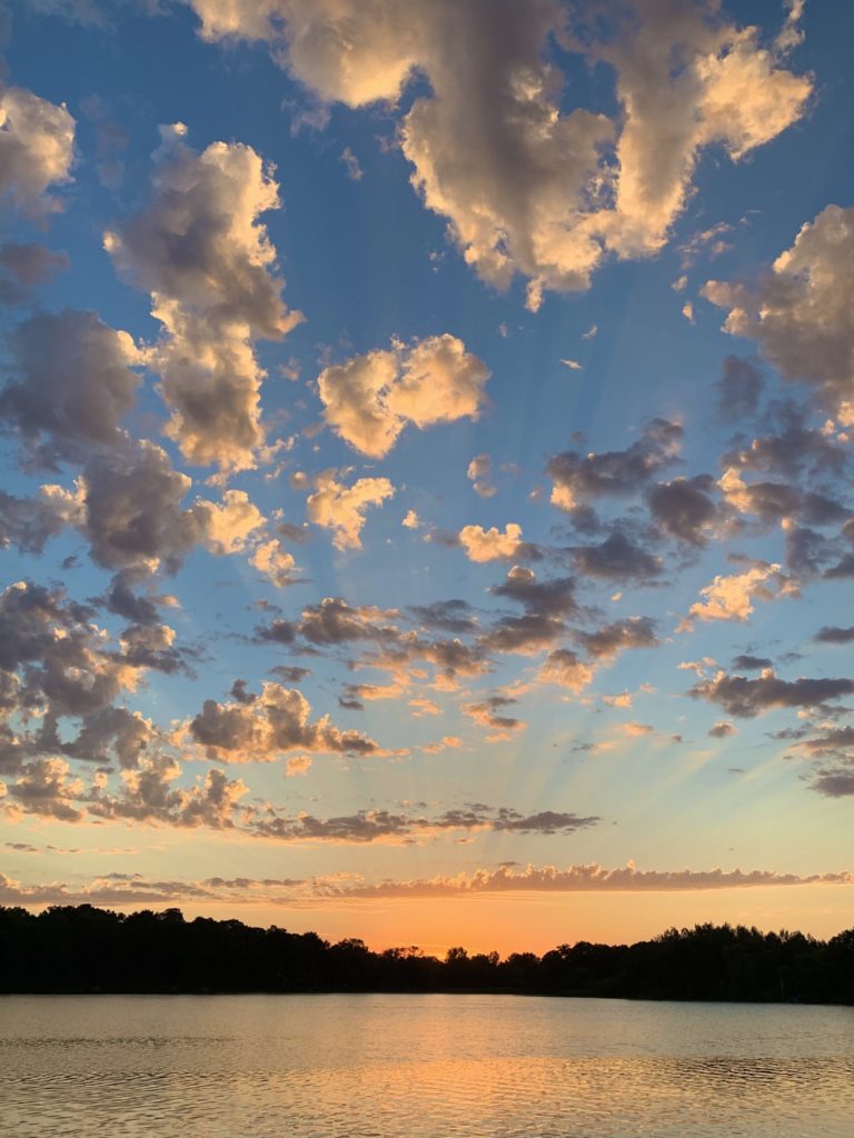 A sunset and luminated clouds
