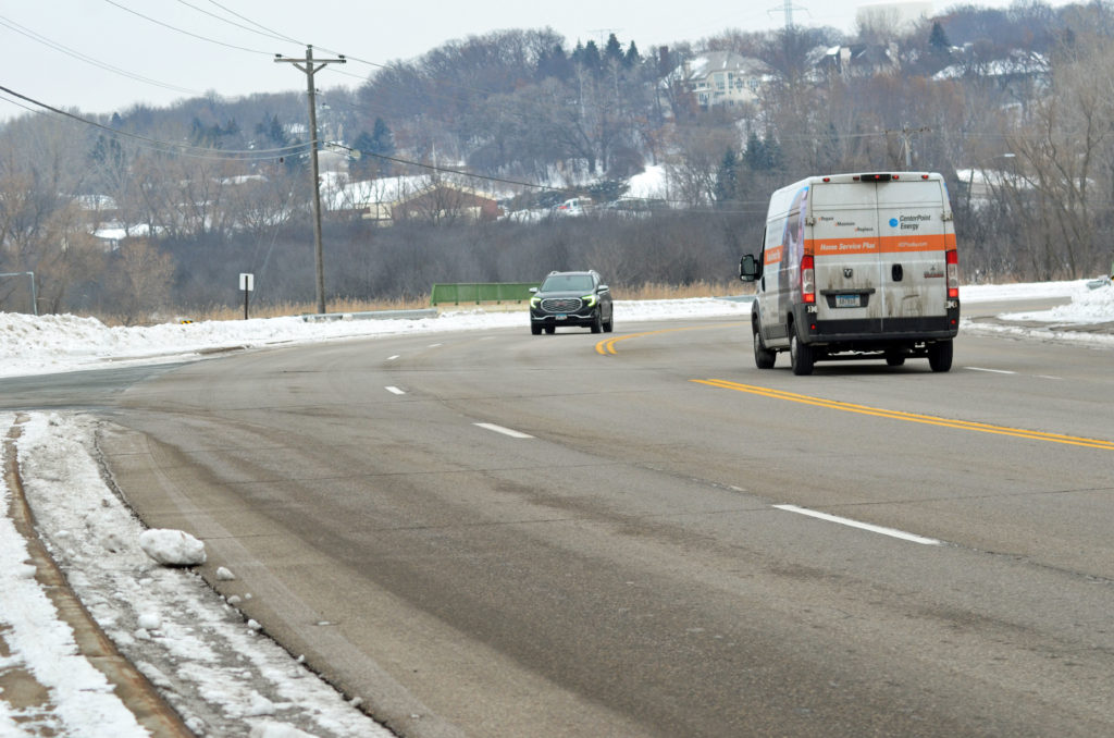 A northbound motorist on Baker Road waited to turn left on Holly Road near Forest Hills Elementary School. Photo credit- Jim Bayer.