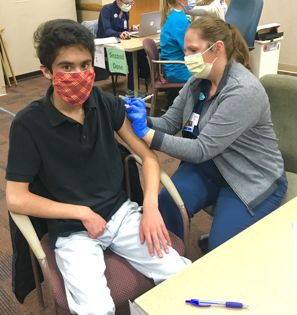 Iesh Gujral received his COVID-19 vaccinations at M Health Fairview Southdale Hospital, where he is a junior volunteer. (Submitted photo)