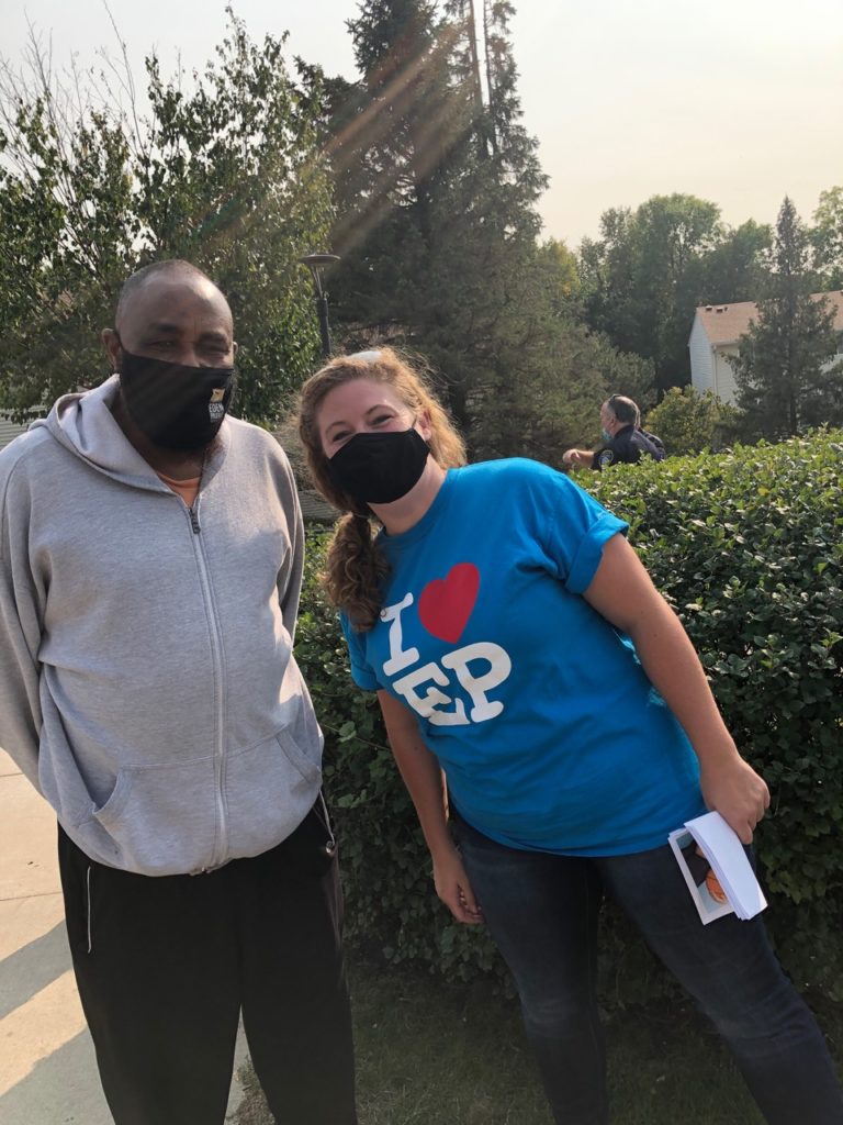 Mohamed Duale and Megan Yerks, staff members of the city’s Housing and Community Services Division, pose during a sports equipment distribution at one of the city’s multifamily properties. The distribution was a joint project between the Eden Prairie Police and Parks and Recreation departments and Scheels. Photo courtesy of the City of Eden Prairie/Megan Yerks