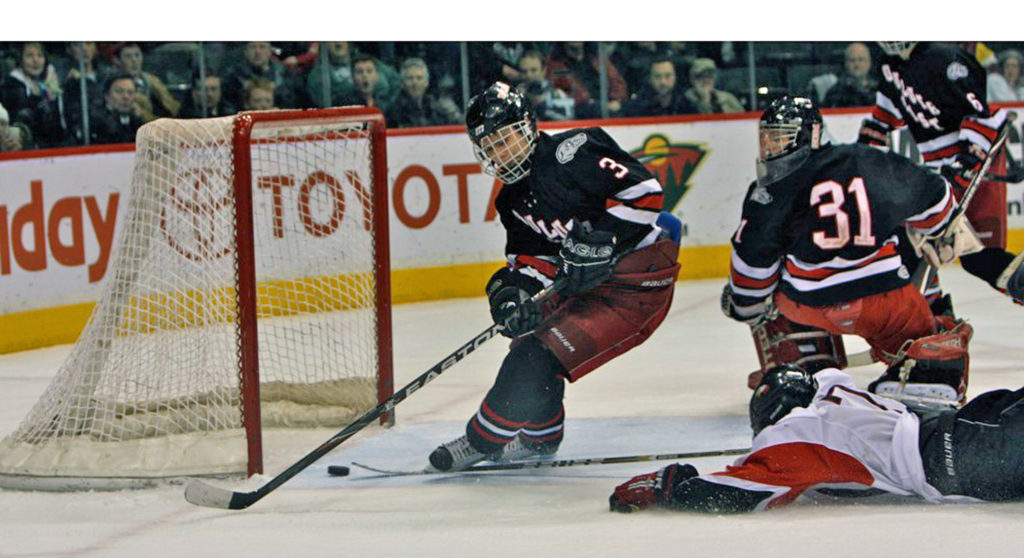 While sliding across the Xcel Energy Center ice in March of 2011, Kyle Rau pushed home the biggest goal in Eden Prairie hockey history. Said goal lifted the Eagles to a 3-2 triple-overtime state-championship-game win over Duluth East.