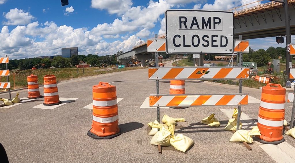 RAMP CLOSED sign, traffic barrels Hwy 212 / Shady Oak Rd