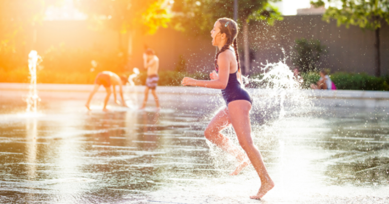 A photo of a girl splash pad