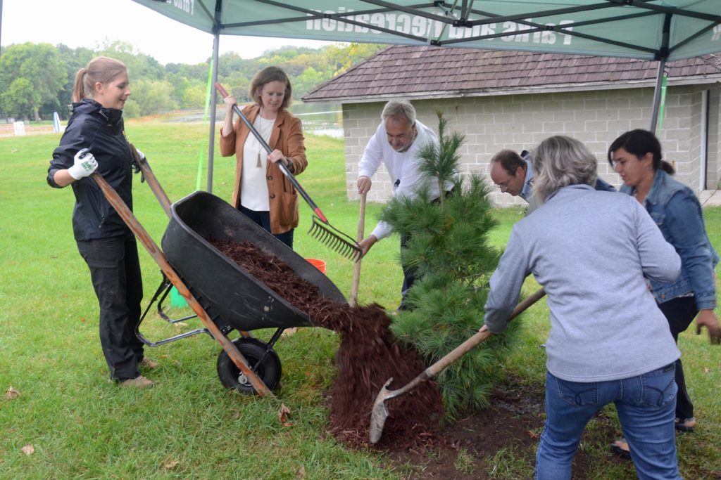 EP forestry technician Lauren Stufft dumping mulch 9-20-21
