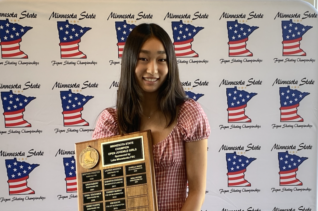 Eden Prairie native Nina Huynh poses with her state championship plaque following her first-place finish in the open juvenile girls division.