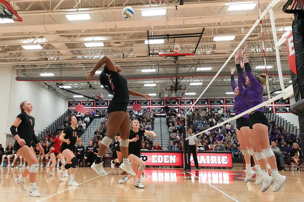 Eden Prairie senior hitter Kendall Minta goes for a hit. She's a key piece of the 2021 Eagle team making this year's state tournament. Photo by Rick Olson