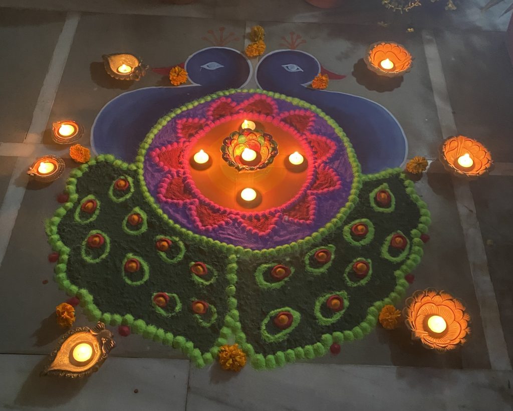 This is a traditional rangoli decoration outside a New Delhi, India, house on Diwali. Photo by Harsh Rampal