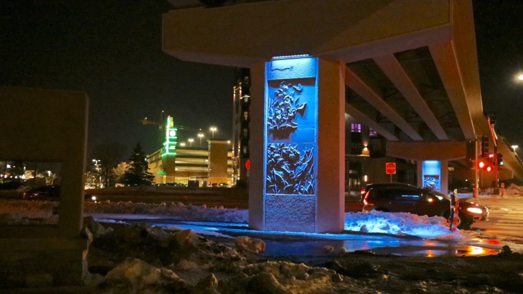 SWLRT bridge piers with art at night