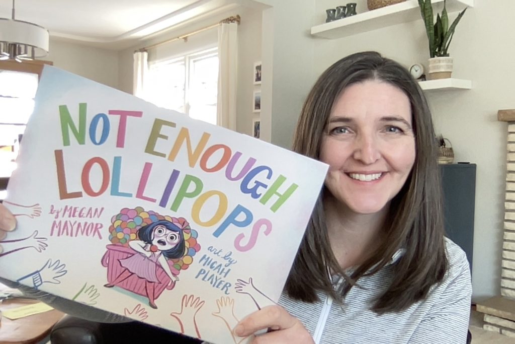 Megan Maynor holds her newly-published book, "Not Enough Lollipops." The children's book author is a 1992 graduate of Eden Prairie High School. Photo courtesy of Megan Maynor