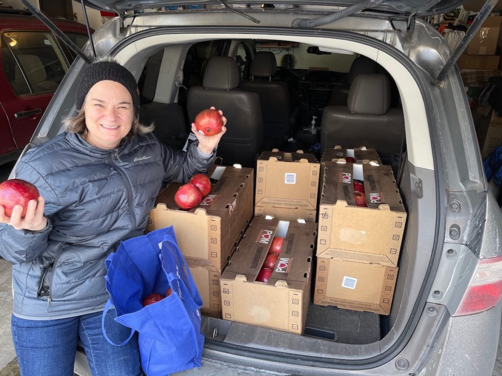 To make Afghani evacuees feel at home, Eden Prairie resident Dawn Martin gave them 216 pomegranates, as well as 253 pounds of fresh strawberries, 21 pounds of walnuts, and 21 pounds of dried apricots. Photo courtesy of Dawn Martin