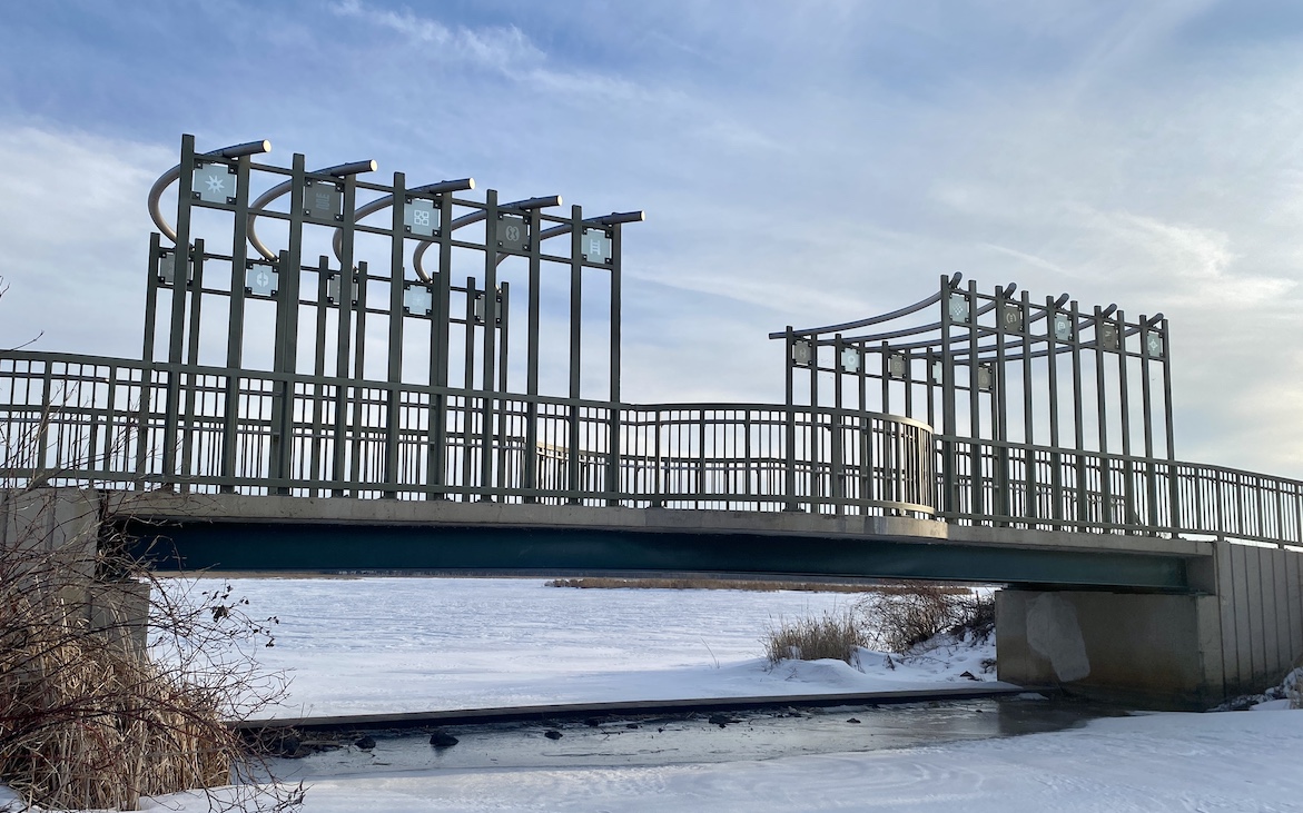 This photo of The Jean Harris Gathering Bridge was snapped during a quick break from a frigid walk around Purgatory Creek Park. Photo by Stuart Sudak