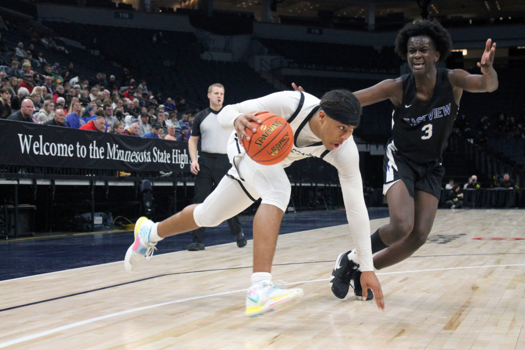 EP's Chiddi Obiazor battled a tough Eastview defense throughout Tuesday's state quarterfinal matchup. Photo by Ryan Williamson.