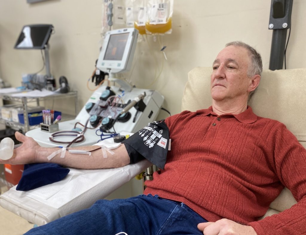Randy Cousins, of Minnetonka, donates blood at the Memorial Blood Centers' Eden Prairie Donor Center on Wednesday, March 16. Photo by Stuart Sudak