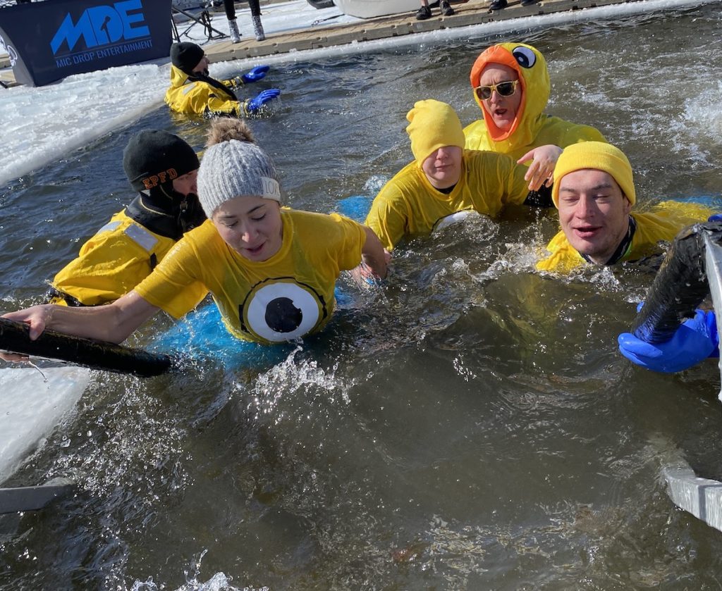 Plungers make their way out of the lake. 