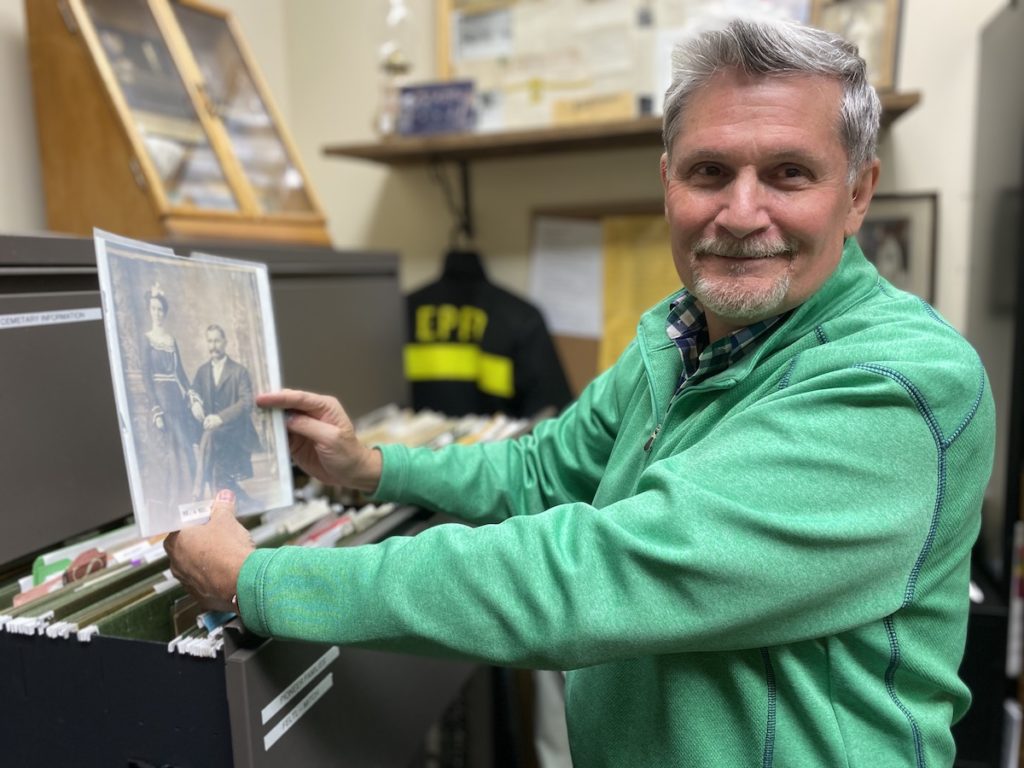 Tom Achartz sifts through the Eden Prairie Historical Society Museum archives to find some interesting stories to share on social media. Those posts can be found at Eden Prairie Remembers on Facebook. Photo by Stuart Sudak