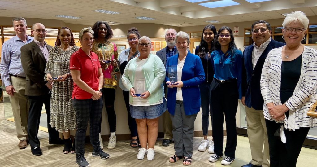 Eden Prairie’s Human Rights and Diversity Commission members pose with the 2021 Human Rights Award winners. (From left) John Urbanski, Phil Skeie, Kimberly Purifoy, Jody Knight, Niamya Holloway, Maddie Vossen, Wendy Vossen, Terry Mackin, Kim Rathjen, Keerthana Ramanathan, Shubhangi Mohan, Babar Khan, and Susan Weaver. Photos courtesy of the City of Eden Prairie.