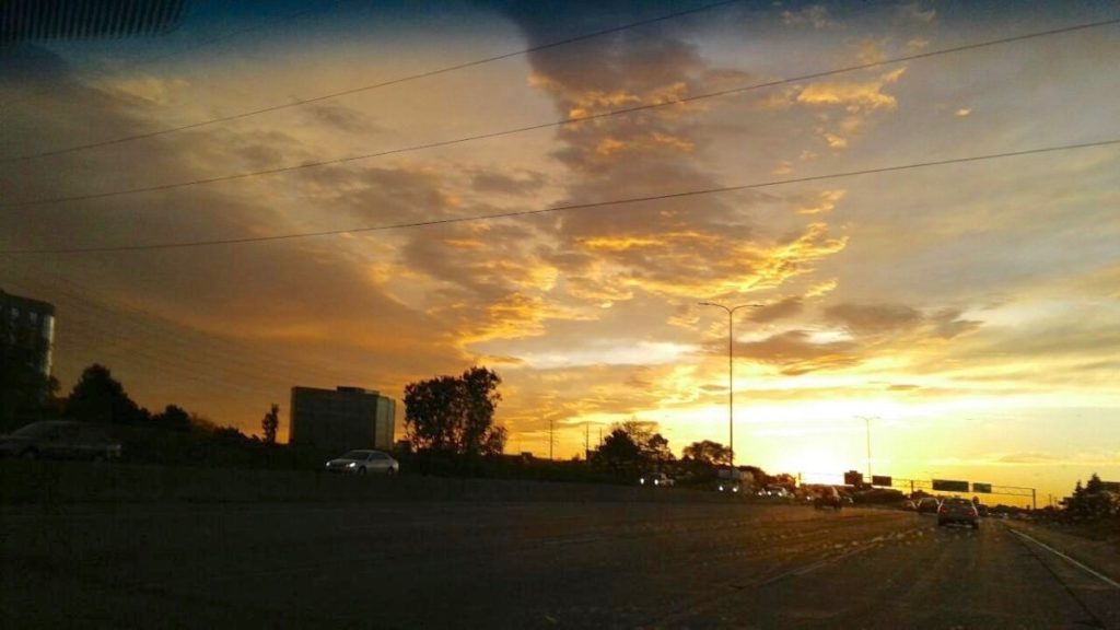 Sunset on Interstate 494 near the Delta hangars. Photo by Jeff Strate