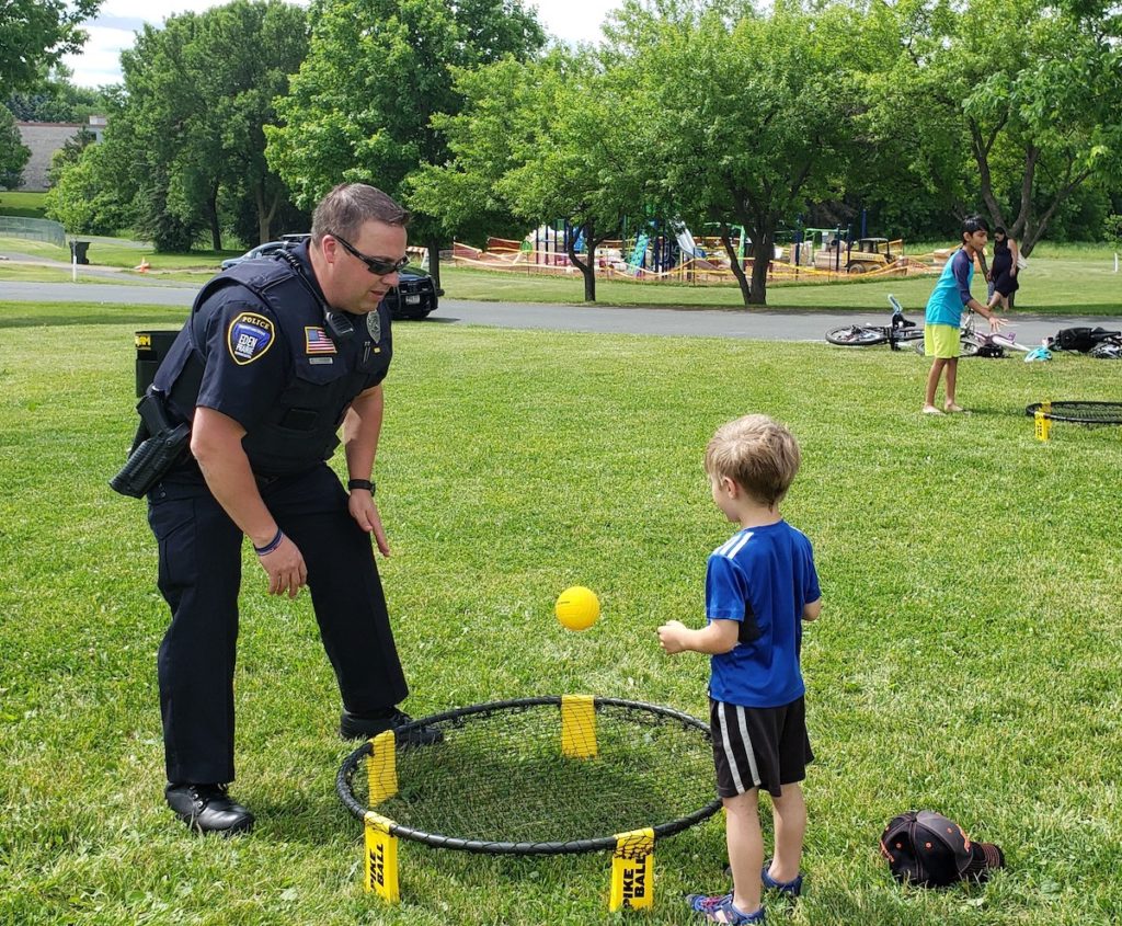 Eden Prairie Police officer TJ Henderson during a past pop-up splash pad event at Nesbitt Preserve Park. Photo courtesy of the City of Eden Prairie