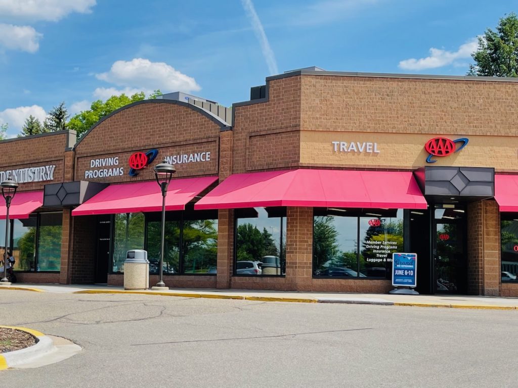 The re-opened AAA Minneapolis branch in Eden Prairie now has a larger retail area with more travel and insurance people.Photos by Vijay B. Dixit