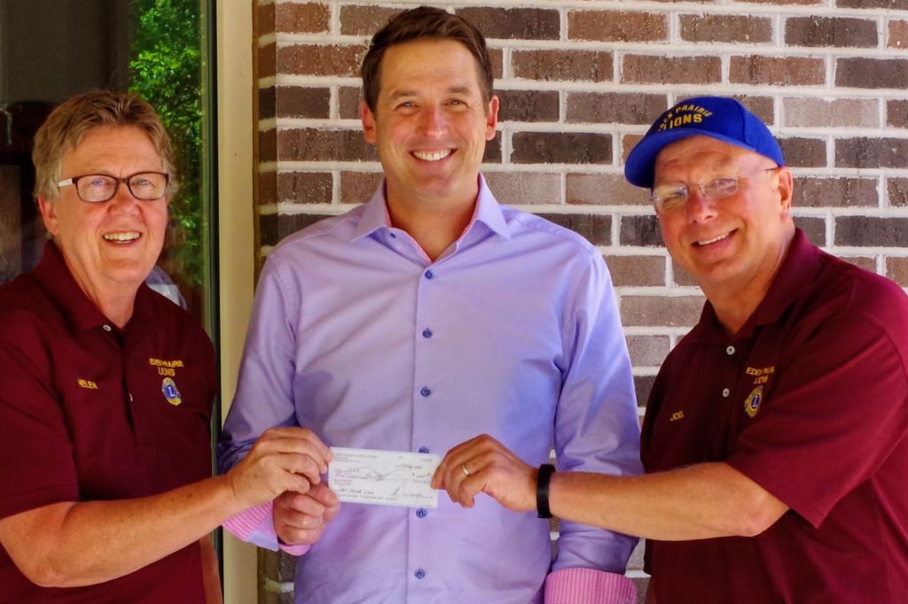 (From left) Eden Prairie Lions Club annual steak fry co-chairperson Helen Laleman, local media personality Chris Egert, and Lions Club President Eden Prairie Lions Club Joel Johnson. Photo courtesy of the EP Lions Club