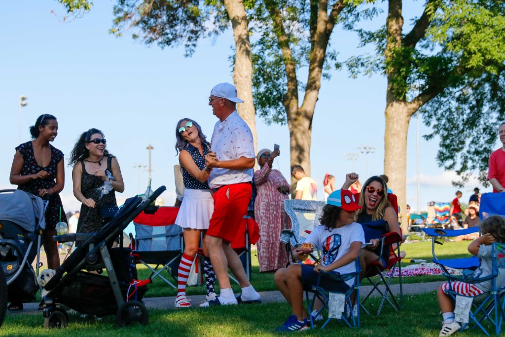 A couple dances to the music near the Round Lake Park stage during last year's 4th of July Hometown Celebration. File photo by Gillian Holte