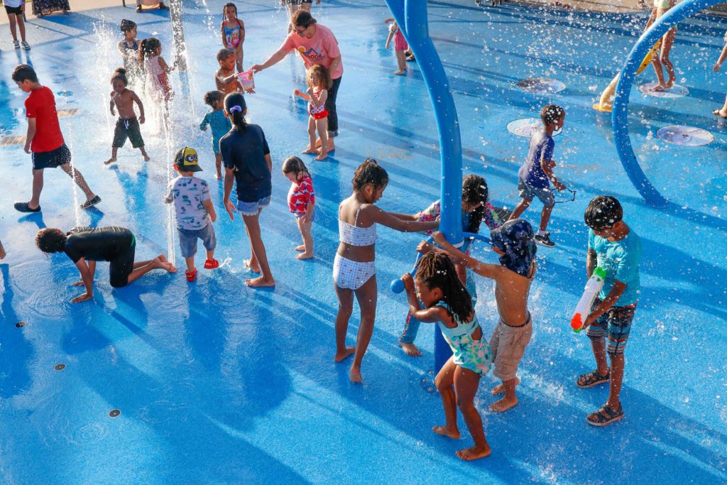 Children play at the Round Lake Park splash pad, one of Eden Prairie's three splash pads, which is open daily from 9 a.m. to 8 p.m. File photo by Gillian Holte