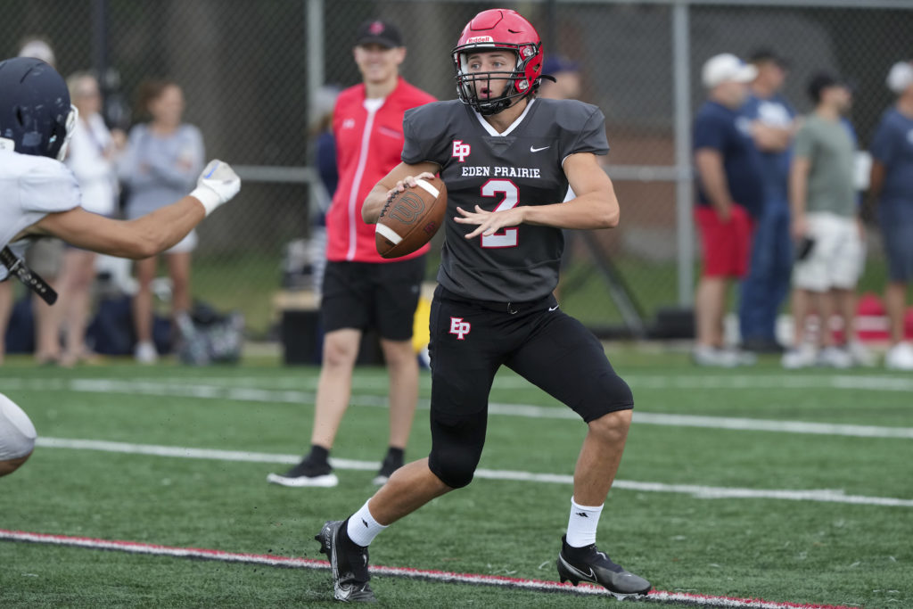 EP senior quarterback Nick Fazi drops back for a pass at the Football Jamboree on Saturday. Photo by Rick Olson