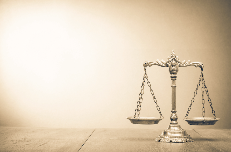 Judge says Scott County attorney suppressed evidence in wrestling coach sex assault case