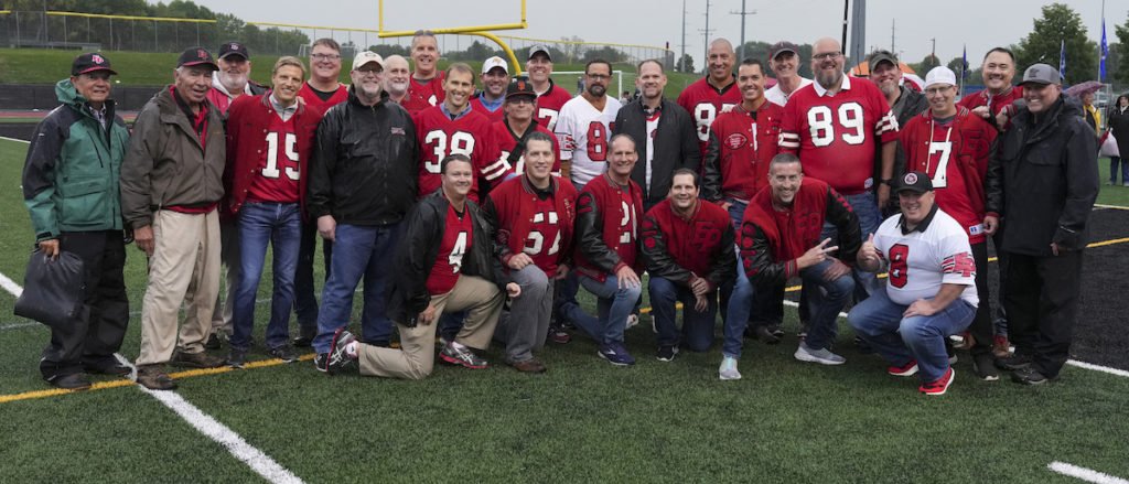 Eagles head coach Mike Grant and his 1992 football team were honored during the pregame ceremony Friday at Aerie Stadium. Photo by Rick Olson
