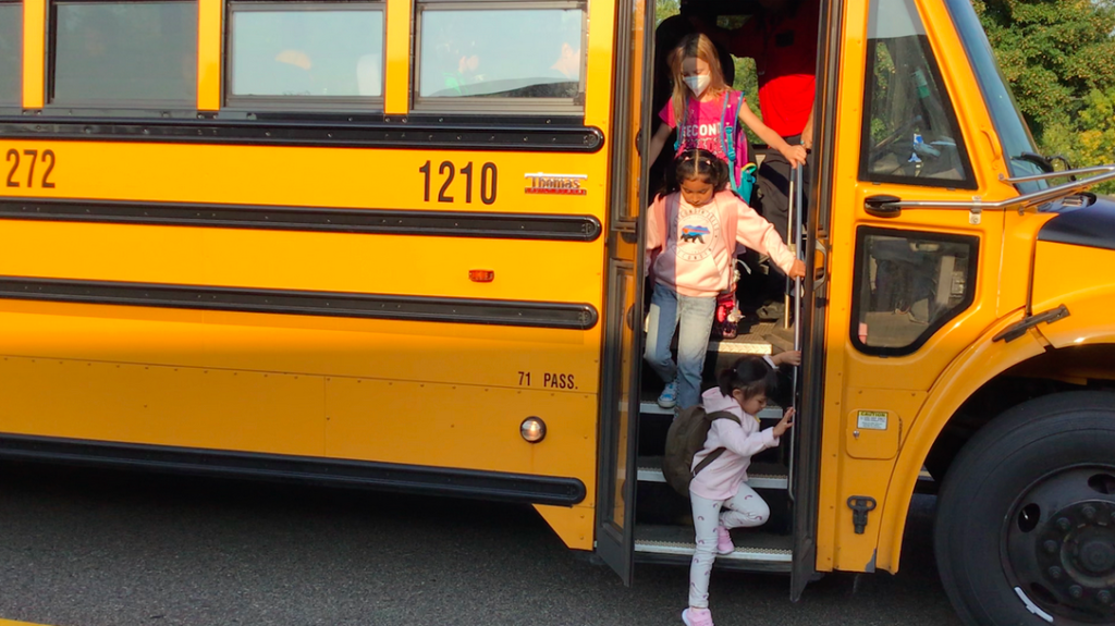Students exiting the bus at Eden Lake Elementary. Photo courtesy of Eden Prairie Schools