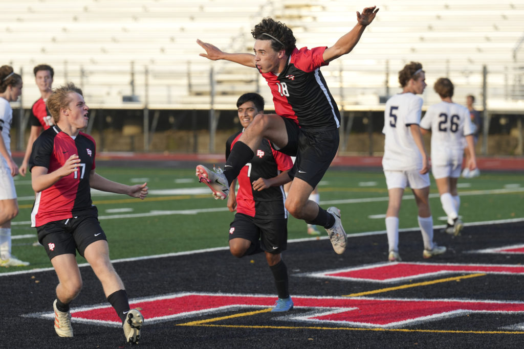 Eagles senior defender Zach Fier scored to tie the game in the second half against Chanhassen. Photo by Rick Olson