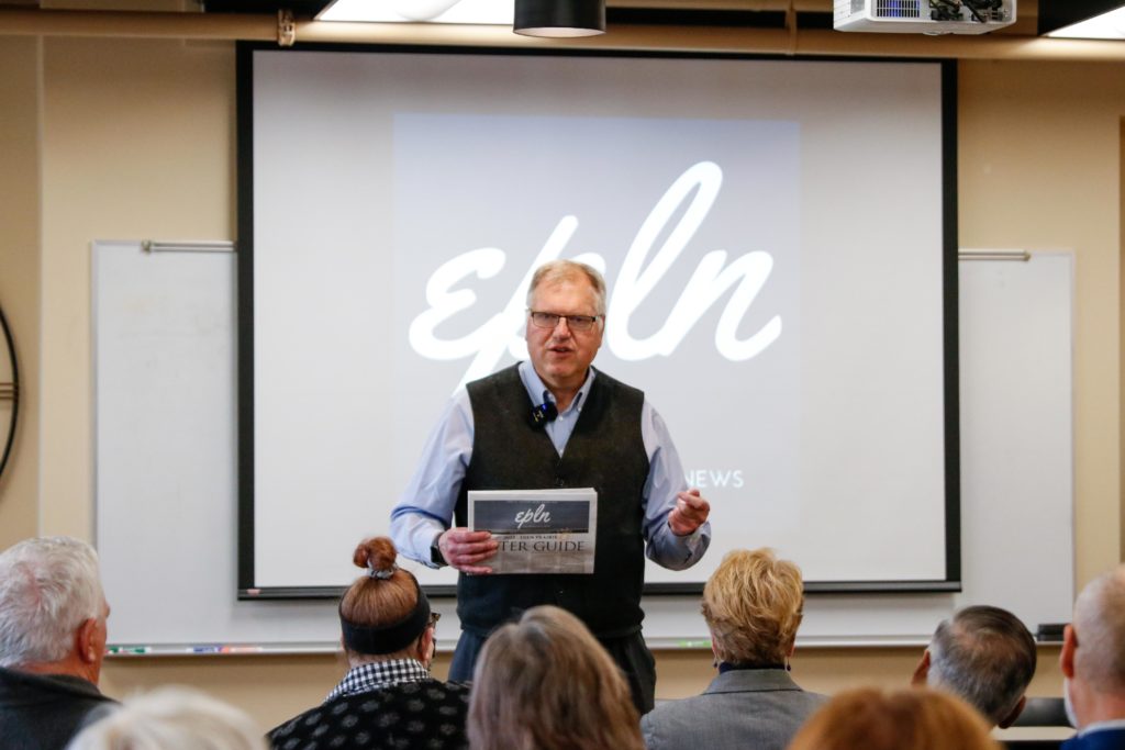 EPLN Publisher/CEO Steve Schewe displays a copy of the 2022 Voter Guide. File photo