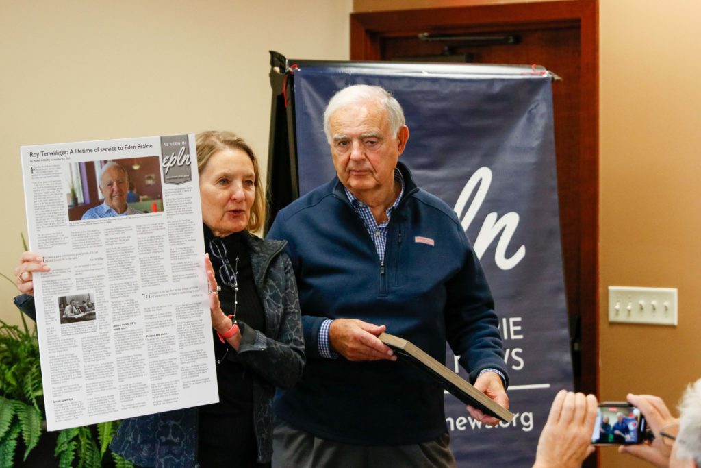 Nancy Tyra-Lukens, who serves as chair of the EPLN board of directors, presents Roy Terwilliger with an article highlighting his lifetime of service to EP that recently appeared on the website. Terwilliger, who is retiring from the EPLN board, was honored during the EPLN Annual Meeting on Monday. Tyra-Lukens is the former longtime mayor of Eden Prairie. Photos by Gillian Holte