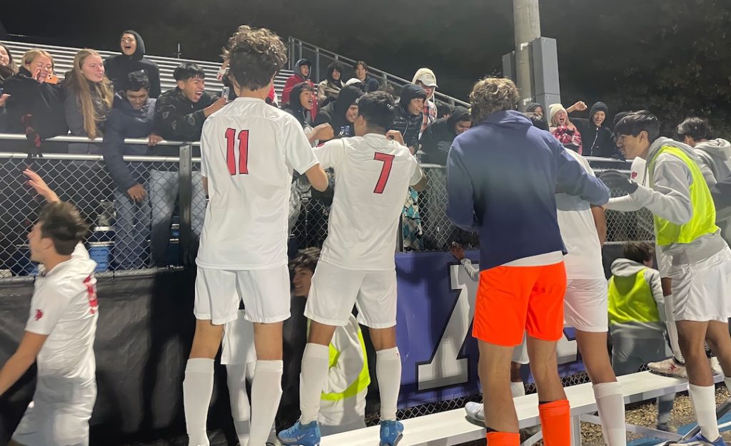 The Eagles boys soccer team celebrates a 2-1 victory over Minnetonka in the Section 2AAA semifinal. Staff photo