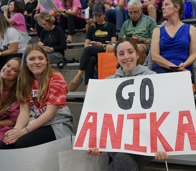 Cheering on their teammates at JV finals are (L-R) Sally Grajkowske, Keira Fogarty, and Merritt Miller. Photo by Lillian Booth