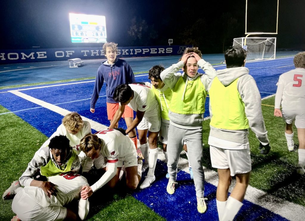 Eagles senior Zach Fier (18) scored the game-winning goal in a sudden-death shootout against Minnetonka in the Section 2AAA semifinals Thursday night. Staff photo