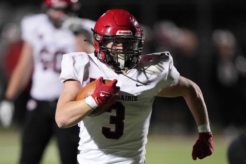 Senior running back Tyler Walden (3) scores one of his four touchdowns in the Eagles 35-14 win over Stillwater on Thursday. Photo by Rick Olson