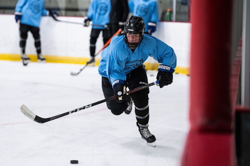 Meaghan Pezon concentrates on the puck at a recent Minnesota Whitecaps practice. Photos courtesy of Sam Silver/Minnesota Whitecaps