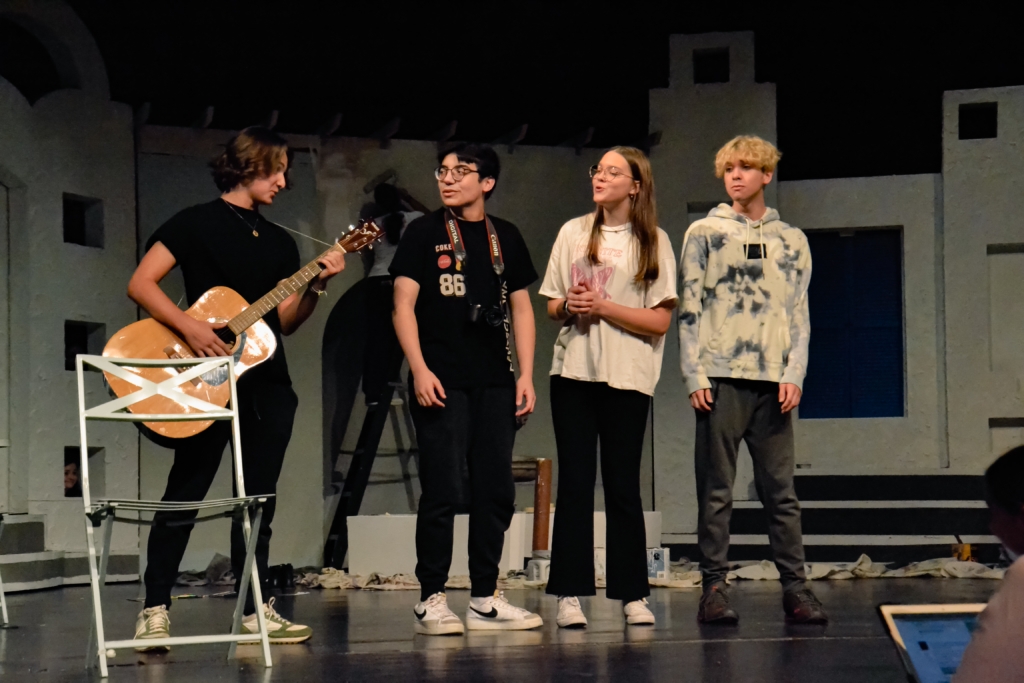 Sophie and her three "dads" during rehearsal. 