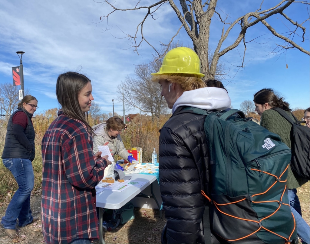 Nora Takes talking with prospective members at the kick-off event. Photos by Juliana Allen