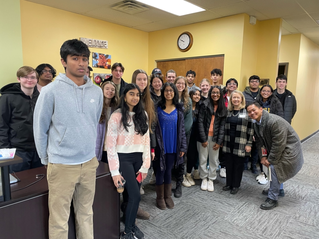 Jenifer Loon, the PROP executive director, gave the iOS Mobile App Development capstone students a tour of PROP and an explanation of their operations so students could practice determining the need for mobile apps. Loon is located on the right side of the picture. Photos courtesy of Eden Prairie Schools 