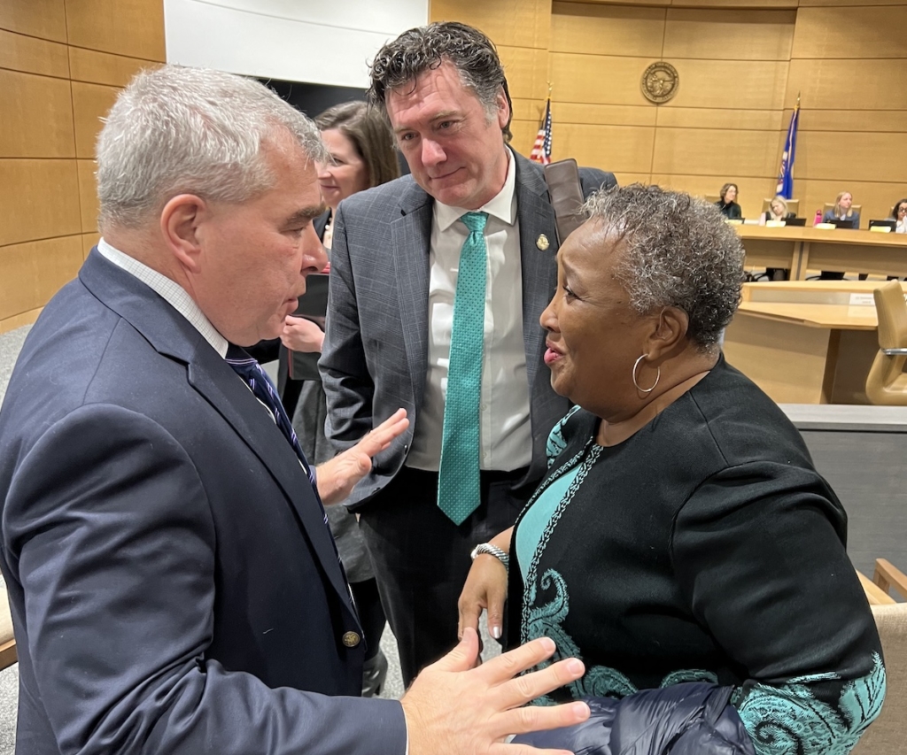 Minnesota state Sens. Steve Cwodzinski and Aric Putnam talk with BARR board member Gail Toatley, a former assistant principal at Eden Prairie High School. Cwodzinski and Putnam are two of the bill's co-sponsors in the Senate. Submitted photo