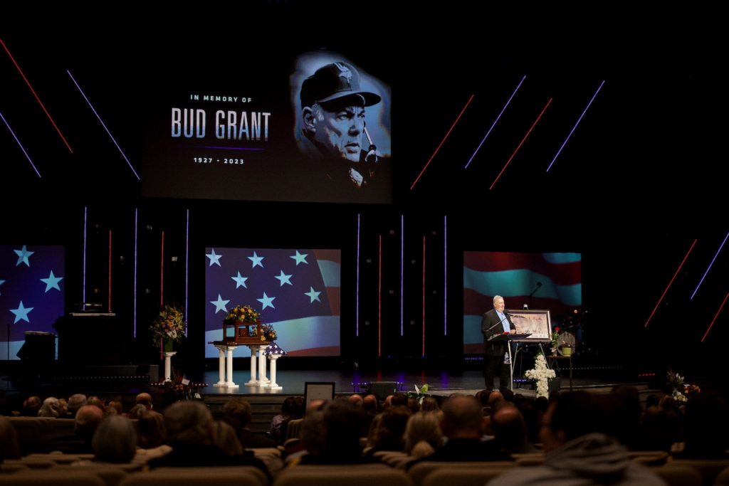 Mike Grant speaks during the memorial service for his father Bud on Saturday at Grace Church in Eden Prairie. Photos by Michael Hirschuber of the Minnesota Vikings