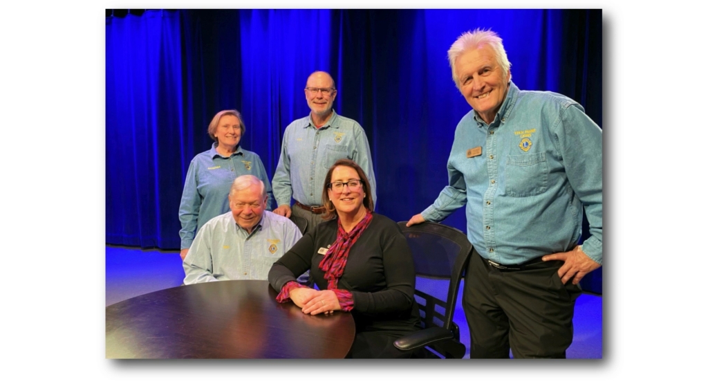 Eden Prairie Lions Show producer/director Barbara Hanson with guests Mike Gruidl (sitting) and Steve Young (standing), pose for a BCAT Studio photo with host Patti Wendling and Richard Klatte on February 7, 2023. Submitted photo