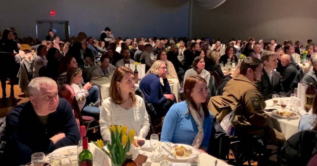 Attendees at the Thank You From Ukraine event on Marcy 18, 2023 listen to Protez C.E.O. Yury Aroshidze.