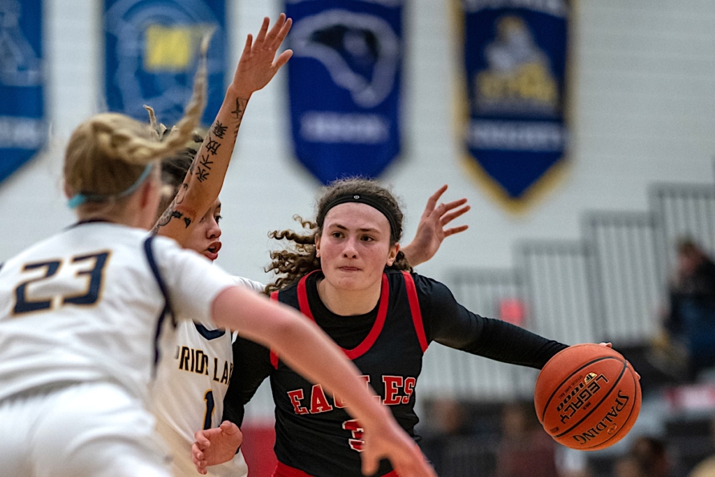 Eden Prairie senior point guard and captain Molly Lenz (3) led the Eagles offense in a 50-36 win over Prior Lake in the Section 2AAAA semifinal on Saturday. Photo by Jeremy Peyer