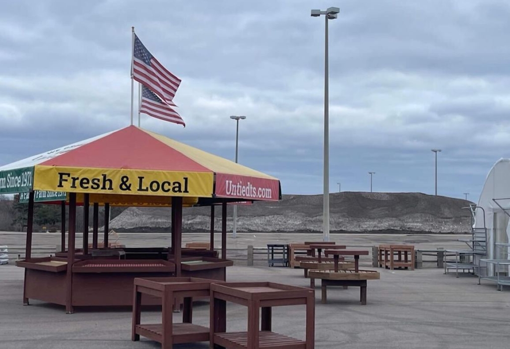 Elizabeth Petry captured this photo of Untiedt's Garden Centers setting up a stand near "Mount Eden Prairie." She humorously noted, "Am I the only one who finds it hysterical that the summer flower and vegetable stand has a snow pile in the background?"