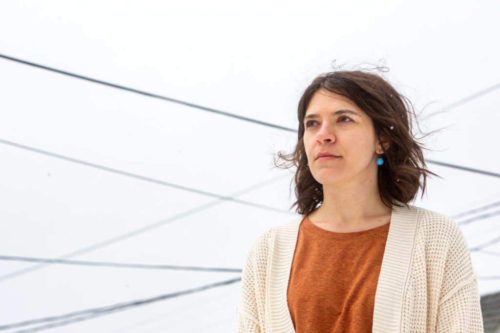 Nurse Taylor Daiello poses for a portrait in her neighborhood in Minneapolis Wednesday, April 5, 2023.  Nicole Neri/for the Minnesota Reformer