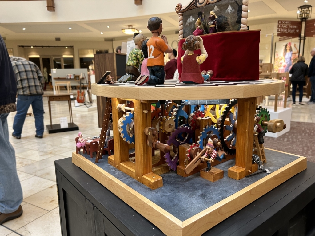 Cecilia Schiller's "Puppet Master" is among the showcased items at the Northern Woods Exhibition in Eden Prairie Center mall this weekend. The piece pays tribute to the art of puppetry and the skills it entails, drawing inspiration from Schiller's experience crafting and performing with puppets. Photos by Vijay Dixit