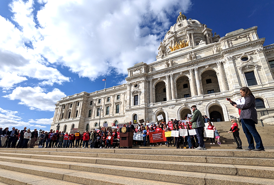 Gov. Tim Walz speaking at a rally on the Capitol steps on Tuesday calling for more gun restrictions in Minnesota. MinnPost photo by Walker Orenstein